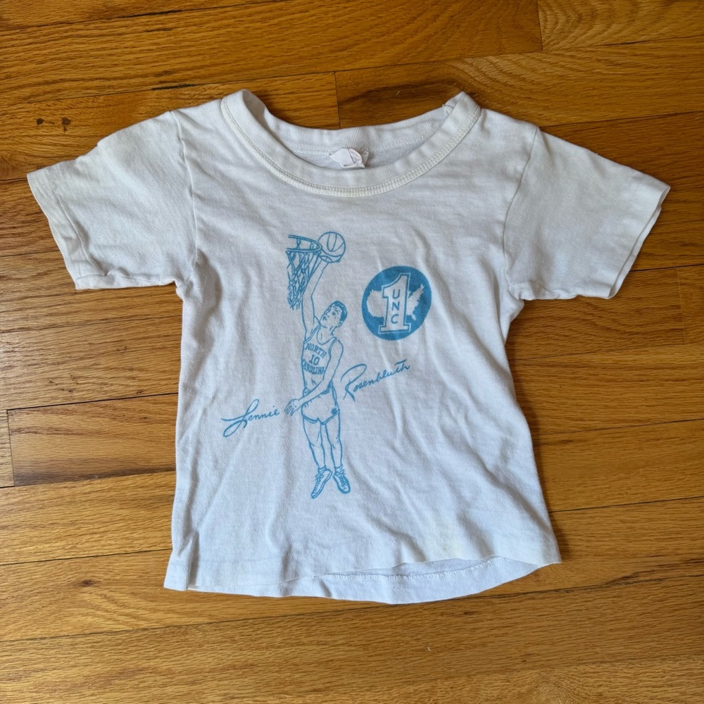 Vintage Hanes White Kids T-Shirt with Light Blue UNC Basketball Graphic